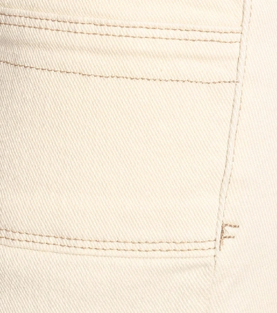 Shop Frame Carpenter High-rise Flared Jeans In White