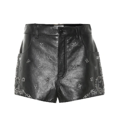 Shop Saint Laurent Embellished Leather Shorts In Black