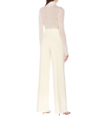 Shop Roland Mouret Palmetto Wool-crêpe Flared Pants In White