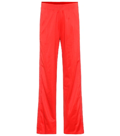 Shop Givenchy Embellished Jersey Trousers In Red