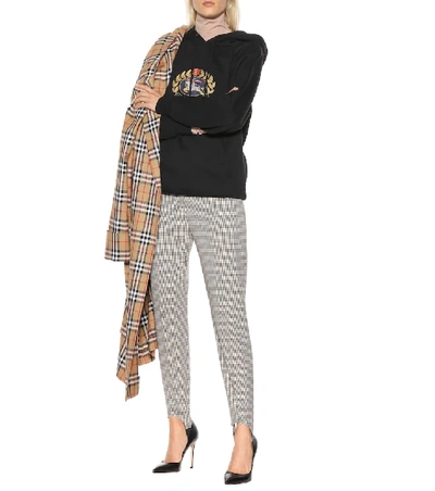 Shop Burberry Checked Stirrup Pants In Brown