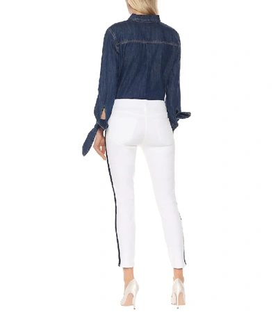 Shop Mother The Looker Ankle Skinny Jeans In White