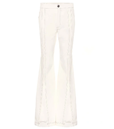 Shop Chloé High-rise Flared Jeans In White