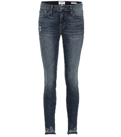 Shop Frame Jeanne Front Chew Skinny Jeans In Blue