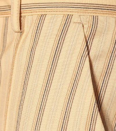 Shop Acne Studios Striped High-rise Flared Wool Pants In Orange