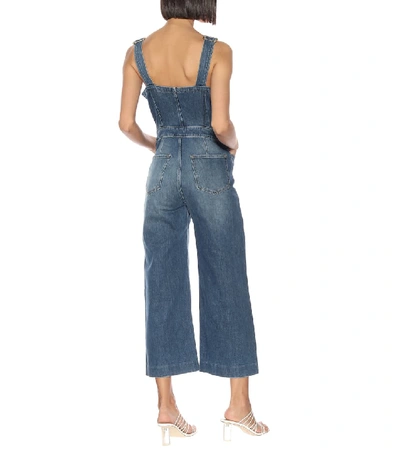 Shop Frame Claire Denim Jumpsuit In Blue