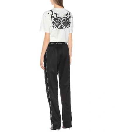 Shop Givenchy Logo-embellished Trackpants In Black