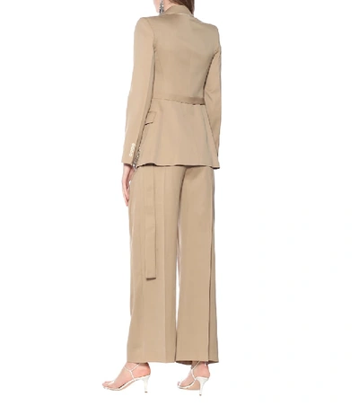 Shop Jw Anderson Embellished Virgin Wool Jacket In Beige