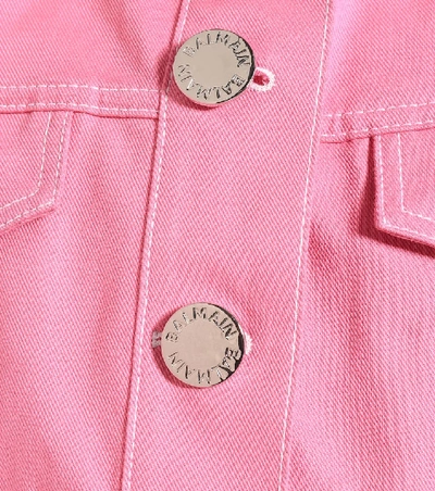 Shop Balmain Cropped Denim Jacket In Pink