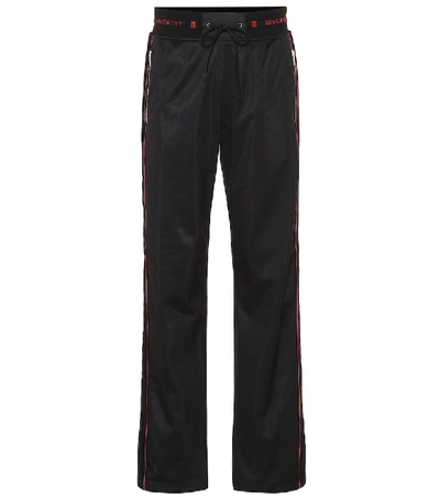 Shop Givenchy Side Stripe Trackpants In Black