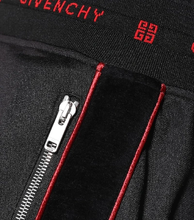 Shop Givenchy Side Stripe Trackpants In Black