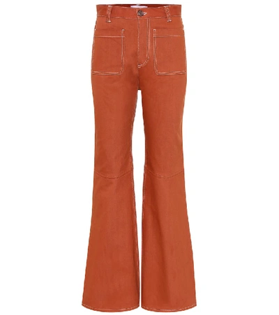 Shop See By Chloé High-rise Flared Jeans In Orange