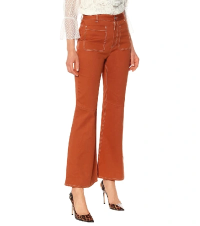 Shop See By Chloé High-rise Flared Jeans In Orange