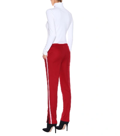 Shop Moncler Cotton-blend Trackpants In Red