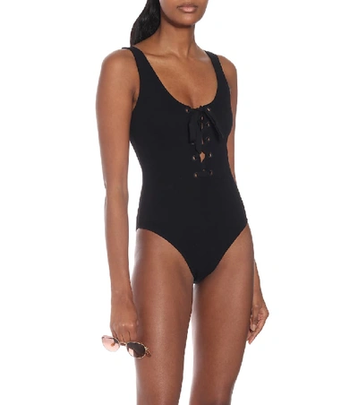 Shop Ganni Ribbed Lace-up One-piece Swimsuit In Black