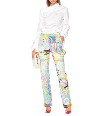 Shop Versace Printed Denim Jeans In Multicoloured