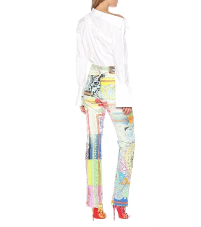 Shop Versace Printed Denim Jeans In Multicoloured