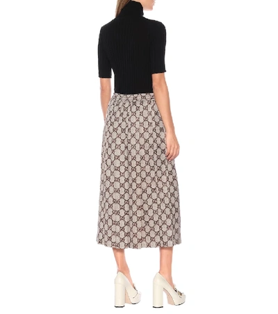 Shop Gucci Gg Pleated Jersey Midi Skirt In Brown