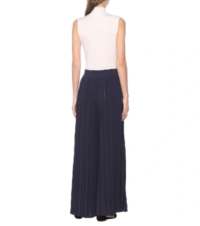 Shop Alaïa High-rise Stretch-knit Pants In Blue