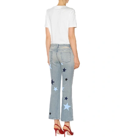 Shop Stella Mccartney Star-printed Flared Jeans In Blue