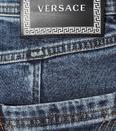 Shop Versace High-rise Straight Jeans In Blue