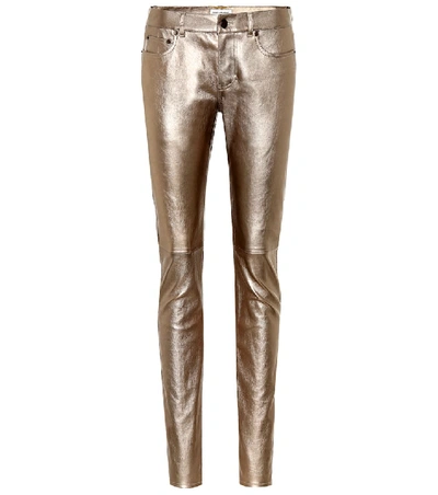 Shop Saint Laurent Low-rise Leather Skinny Jeans In Metallic