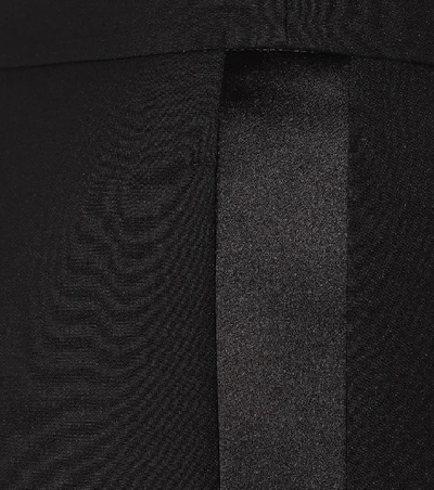 Shop Alexander Mcqueen Mid-rise Flared Wool-blend Pants In Black