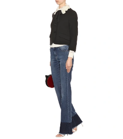 Shop Red Valentino Raw Hem Jeans In Blue