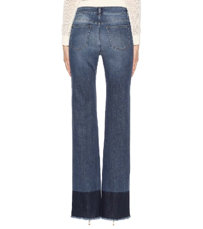 Shop Red Valentino Raw Hem Jeans In Blue