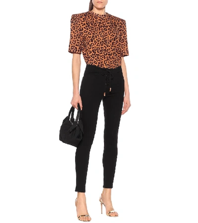 Shop Frame Le Skinny De Jeanne Mid-rise Jeans In Black