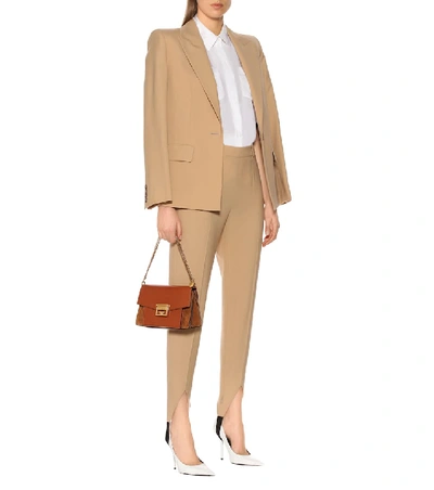 Shop Givenchy Mid-rise Wool Stirrup Pants In Beige