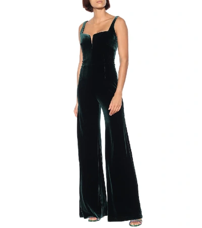 Shop Galvan Eclipse Velvet Jumpsuit In Green