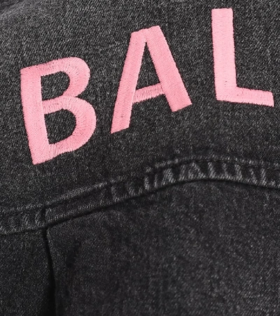 Shop Balenciaga Logo Oversized Denim Jacket In Black