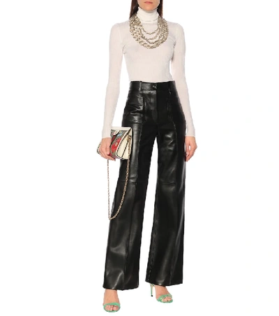 Shop Gucci High-rise Leather Bootcut Pants In Black