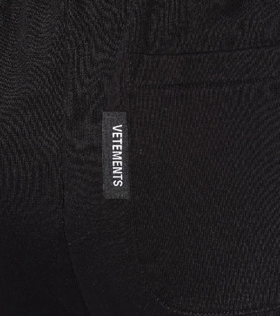 Shop Vetements Logo Cotton-jersey Sweatpants In Black