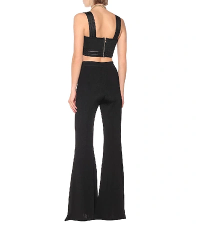 Shop Balmain High-rise Flared Knit Pants In Black