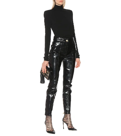 Shop Balmain Coated Skinny Jeans In Black