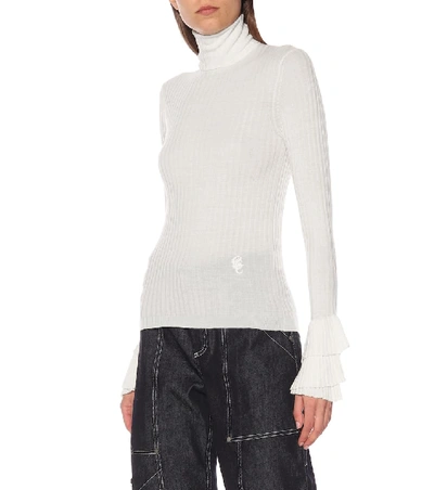 Shop Chloé Ribbed Wool Turtleneck Sweater In White