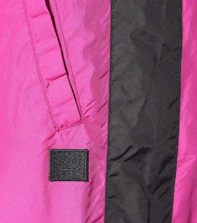 Shop Acne Studios Nylon Trackpants In Pink