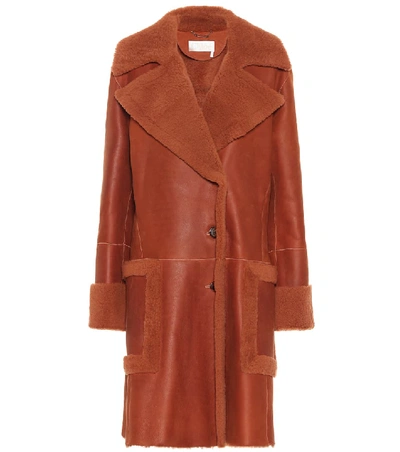 Shop Chloé Shearling Coat In Orange