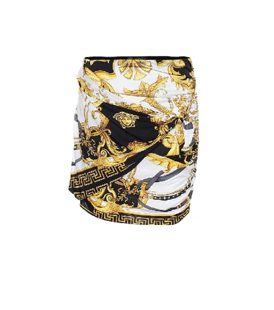 Shop Versace Printed Miniskirt In Gold