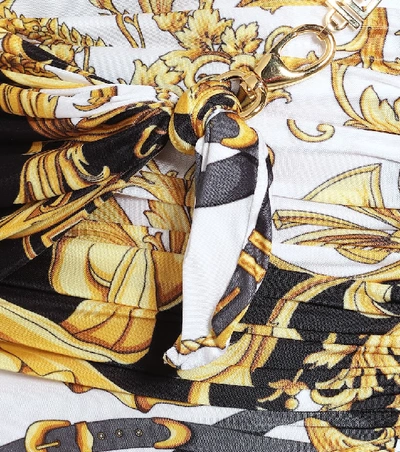 Shop Versace Printed Miniskirt In Gold