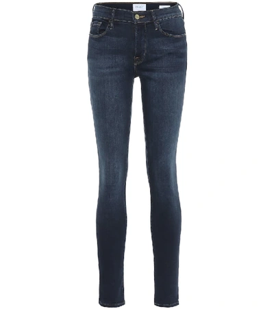 Shop Frame Le Skinny De Jeanne Mid-rise Jeans In Blue