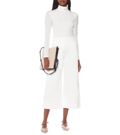 Shop Jil Sander Jersey Turtleneck Top In White