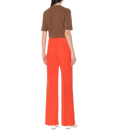 Shop Victoria Beckham Wool Wide-leg Pants In Orange