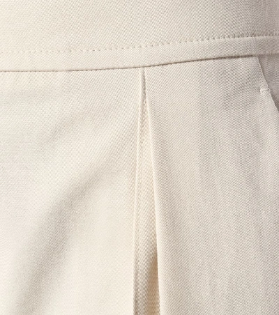 Shop Brunello Cucinelli Cotton-blend Tapered Pants In Beige