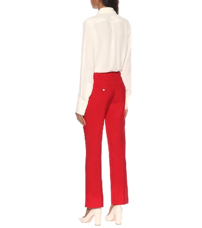 Shop Valentino High-rise Flared Wool-blend Pants In Red