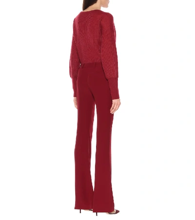 Shop Alexander Mcqueen Mid-rise Flared Pants In Red
