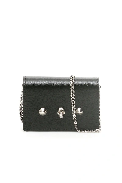 Shop Alexander Mcqueen Skull Stud Chain Strap Wallet In Black