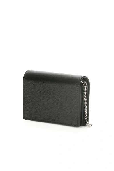 Shop Alexander Mcqueen Skull Stud Chain Strap Wallet In Black